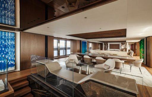 Superyacht charter SILVER FOX interiors with large seating area