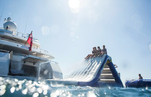 Inflatable slide on superyacht TITANIA