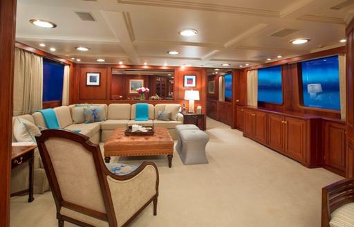 L-shaped sofa in main salon of charter yacht ‘Lady J’ 