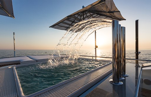 The jacuzzi with a rainfall setting on luxury yacht Ocean Paradise