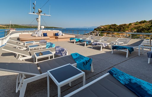 Charter yacht LUPUS MARE sun loungers on deck