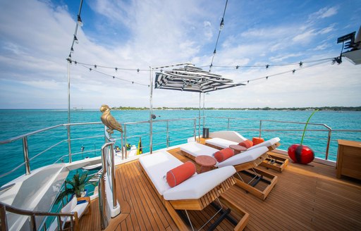 Sun loungers on the deck of luxury yacht charter REHAB 