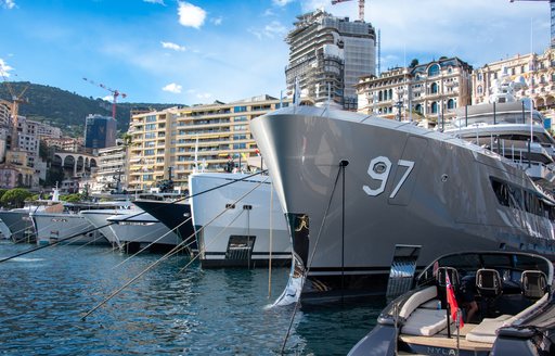 Line of superyacht bows berthed in Port Hercule