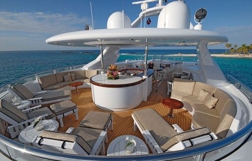 chaise loungers line up on the sundeck of luxury yacht ALLEGRIA 