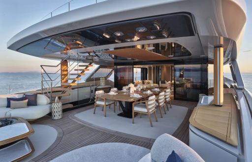 Superyacht charter AWANDRA exterior lounge and dining area