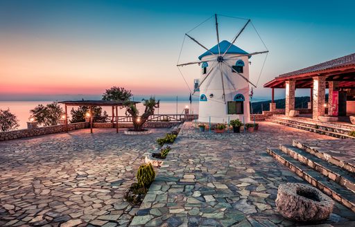 Cycladic windmill at sunset