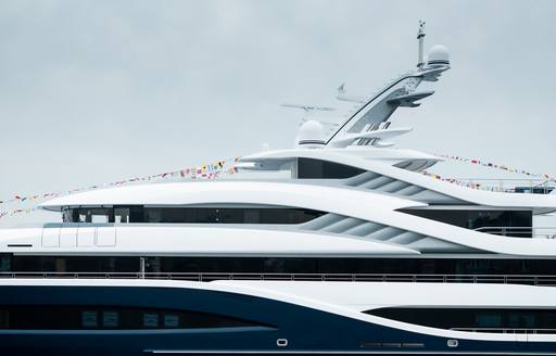 Charter yacht ANGELIQUE superstructure and flags during launch