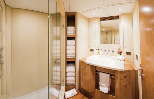 Guest cabin ensuite with sink unit and shower cubicle onboard boat charter BENITA BLUE