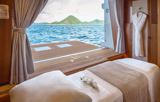 Superyacht charter AMOR A VIDA massage room and open balcony