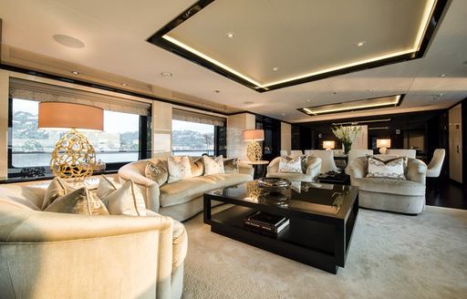 Plush interior lounge onboard charter yacht MELLON