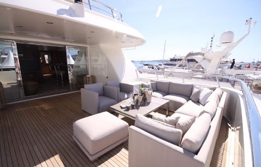 Comfortable seating area on deck of explorer yacht SEAL