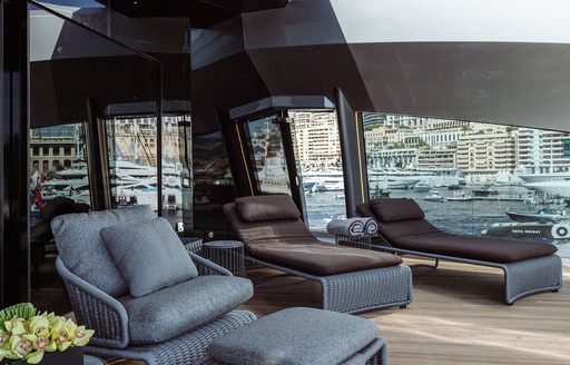 Charter yacht THIS IS IT sun loungers on deck