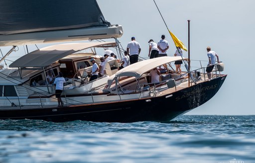 crew at work on the aft deck of sailing yacht SASSAFRAS during the NZ Millennium Cup