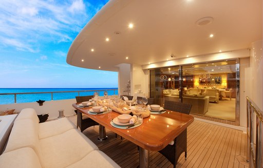 al fresco dining area on the aft deck of expedition yacht BELUGA