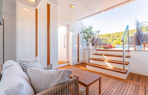 Charter yacht VICTORY beach club interiors with seating