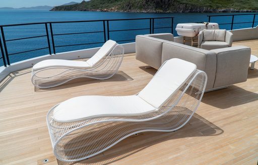 Charter yacht DULCE DE LECHE sun loungers on deck