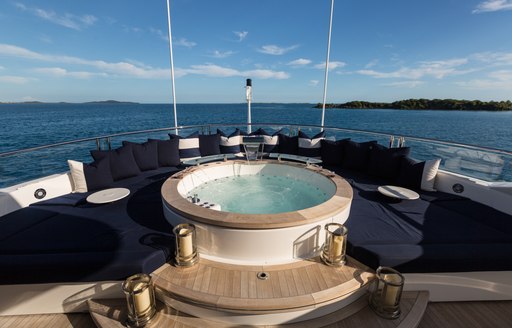 A Jacuzzi on a superyacht looking out across the water