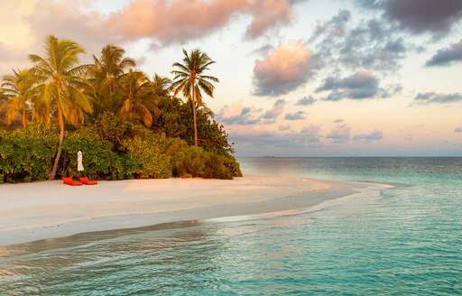 tropical island, perfect for visiting on yacht charter