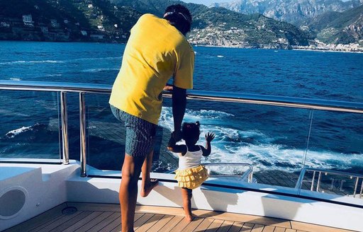 Rapper Jay-Z and his daughter Rumi on luxury yacht KISMET