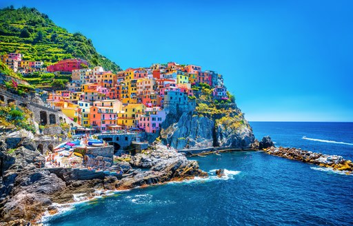 Beautiful colorful cityscape on the mountains over Mediterranean sea 