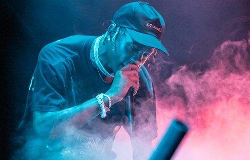 rapper Travis Scott performing in front of a large audience on the main stage of Abu Dhabi Grand Prix 2019 after the first day of practise races