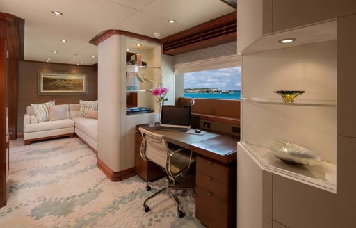 the private office that is also part of the master's suit in motor yacht time for us