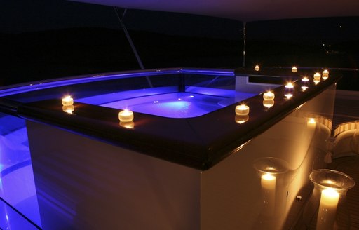 luxury motor yacht PEGASUS deck jacuzzi illuminates beautifully at night