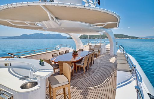 Yacht rental OASIS exterior dining area