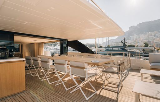 Exteriors onboard charter yacht ANDIAMO with alfresco dining set up