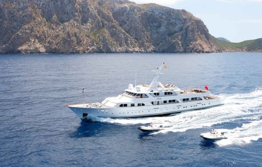 Charter yacht MIRAGE running with her tenders