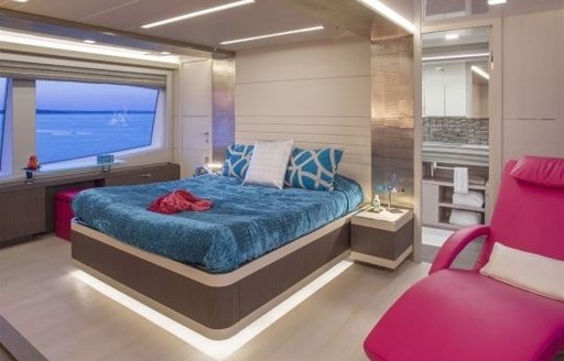 idyllic master suite with blue linen aboard superyacht Alandrea