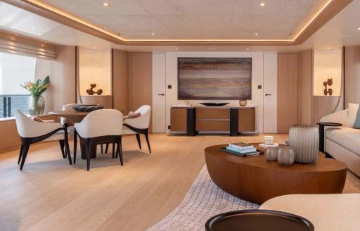 Superyacht charter QU2 upper salon interior with seating options