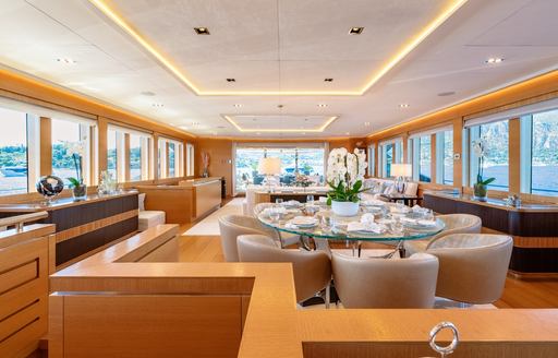 Charter yacht DB9 interior with dining area