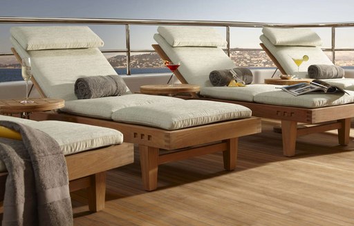 sun loungers line up on the sundeck of motor yacht GLADIATOR 