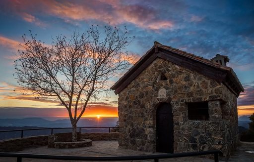 Malaga - Montes de Málaga Natural Park building sunset