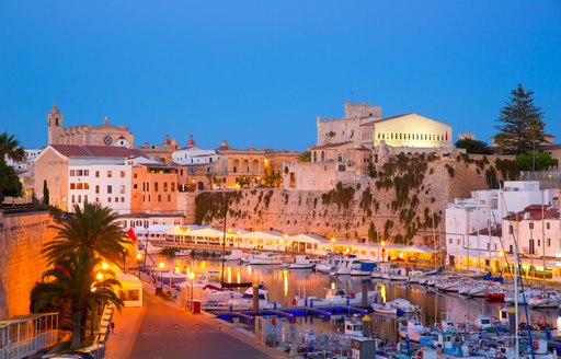 Ciutadella Menorca marina Port sunset town hall and cathedral in Balearic islands