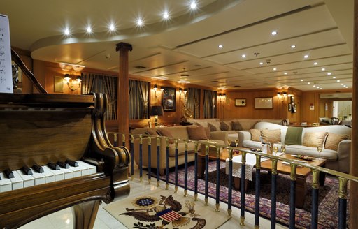 Lounge bar and piano room on superyacht Christina O