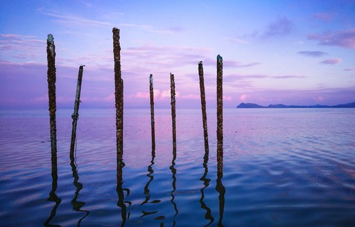 Setting sun above ocean in Thailand