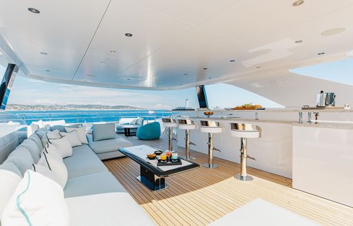 Charter yacht ORION exterior wet bar and stools