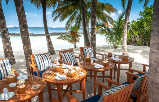 Table set-up on sandy beach in the Caribbean