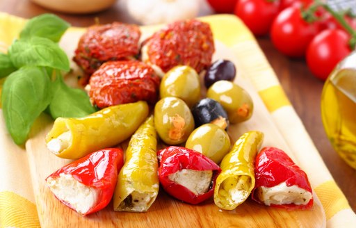 stuffed peppers and olives served in Greece