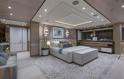 full-beam master suite with large bed on board charter yacht THUMPER