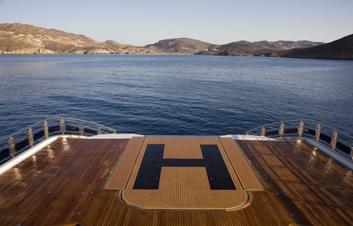 Superyacht Alfa Nero's pool converts into a helipad