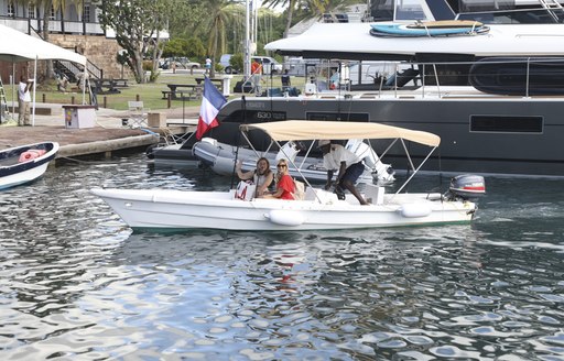 tender carrying yacht crew during antigua show