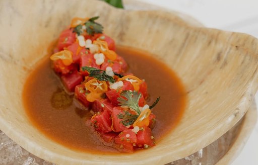 SĀN Beach plated cuisine with tomatoes