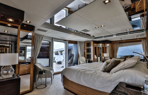 full-beam master suite with neutral colour palette on board charter yacht Africa I