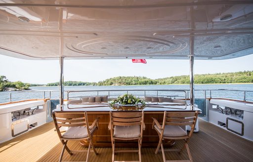 beautiful table set up onboard luxury yacht charter