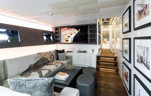 Charter yacht BEACHOUSE interior seating area with staircase