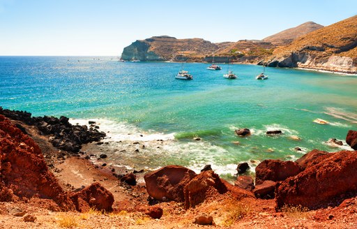 Waters at red sand beach greece