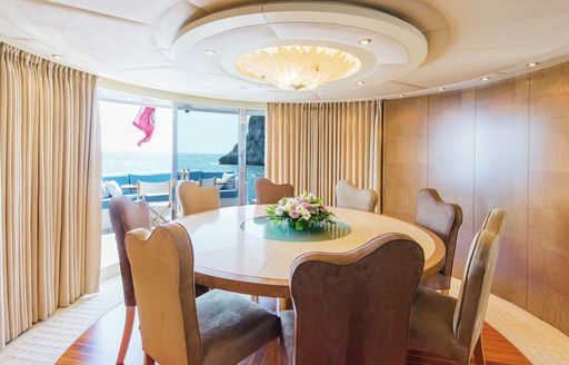 Interior dining area onboard Boat charter BENITA BLUE